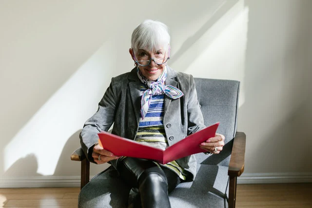 Mature woman sitting down